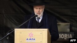 This photo taken July 18, 2017, shows Chief Rabbi Gabriel Davidovich delivering a speech during the commemoration of the 23rd anniversary of a terrorist bombing attack against a Jewish community center in Buenos Aires. 