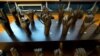 FILE - A sculpture of hands signing the alphabet is seen at Gallaudet University museum in Washington, Dec. 11, 2019. 