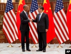 美国总统奥巴马和中国国家主席习近平在杭州西湖国宾馆会谈前握手（2016年9月3日）