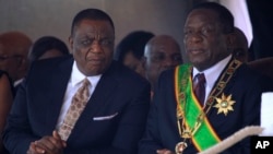 UMongameli Emmerson Mnangagwa lomsekeli wakhe uMnu. Constantino Chiwenga, Harare, Aug. 13, 201