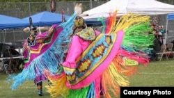 This photo shows Fancy Shawl dancers performing at a pow wow in San Jose, Cal., date unknown.