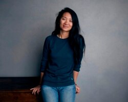 FILE - In this Jan. 22, 2018, file photo, Chloe Zhao poses for a portrait during the Sundance Film Festival in Park City, Utah.