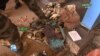 This video grab obtained by AFPTV from Office de Radiodiffusion-Télévision du Mali (ORTM) on September 17, 2024 shows clothes and boots in Bamako.