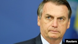 Presiden Brazil Jair Bolsonaro dalam sebuah acara di Brasilia, Brazil, 21 Mei 2019. (Foto: Reuters)