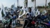 Apoiantes do partido Movimento Democrático de Moçambique (MDM) em campanha 