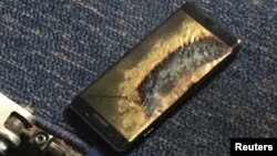 The burned Samsung Note 7 smartphone belonging to Brian Green is pictured in this undated handout photo obtained by Reuters, Oct. 6, 2016. 
