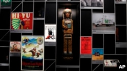 Objects using imagery of Native Americans are on display at the "Americans" exhibit at the Smithsonian's National Museum of the American Indian in Washington, Feb. 9, 2018. 