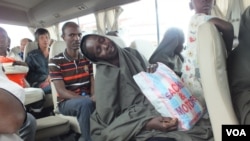 After months of captivity by suspected Boko Haram militants, ex-hostages arrive at Cameroon's Yaounde Nsimalen International Airport.