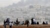 Kurd Fighters Struggle to Defend IS-Besieged City