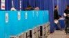 Voters cast ballots at the Chicago Early Voting Loop Supersite in Chicago, Oct. 24, 2024.