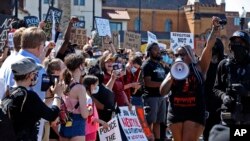 Protesters participate in a Black Lives Matter rally on Mount Washington in Pittsburgh on June 7, 2020, to protest the death of George Floyd.