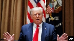 El presidente Donald Trump durante la ceremonia de firma del decreto 'Contrata Estadounidenses', que tuvo lugar en la Casa Blanca.