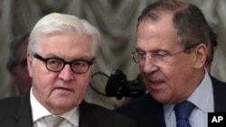 Франк-Вальтер Штайнмаєр і Сергій Лавров