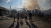 Ukraine says it sank Russian submarine, hit airfield, oil depots