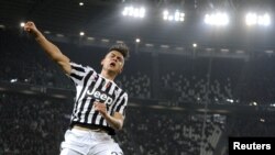 Paolo Dybala de la Juve celebrant un but lors du match Juventus - Sassuolo en Serie A au stade de Turin le 3 mars 2016 REUTERS/Giorgio Perottino 