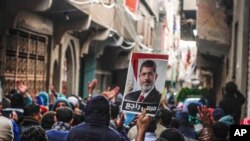 Manifestations de partisans de Mohamed Morsi au Caire en Egypte le 25 janvier 2016.