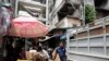 Evictees Begin to Leave Phnom Penh’s Crumbling ‘White Building’
