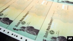 Los investigadores afirmaron que los cheques de estímulo del gobierno por la pandemia salvaron a EE.UU. de una cifra mayor de pobreza.