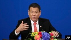 Philippine President Rodrigo Duterte delivers a speech during the Philippines-China Trade and Investment Forum at the Great Hall of the People in Beijing, Oct. 20, 2016. 