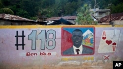 A mural feature senatorial candidate Guy Philippe in Pestel, Haiti, Aug. 25, 2016.