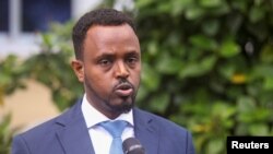 FILE - Somali deputy information minister Abdirahman Yusuf speaks during a news conference in Mogadishu, Somalia, May 6, 2021.