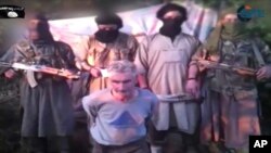 Hervé Gourdel, peu avant d'être décapité par des djihadistes (AP)