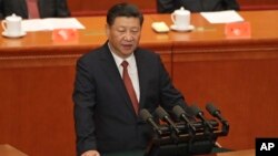 中國國家主席習近平在北京人民大會堂舉行的解放軍建軍90周年大會上發表講話。（2017年8月1日）
