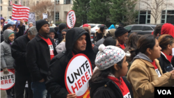 People from around the United States marched in Washington, D.C., Saturday in support of rights of immigrants, refugees and Muslim communities ahead of next Friday's inauguration of President-elect Donald Trump. (A. Barros/VOA)