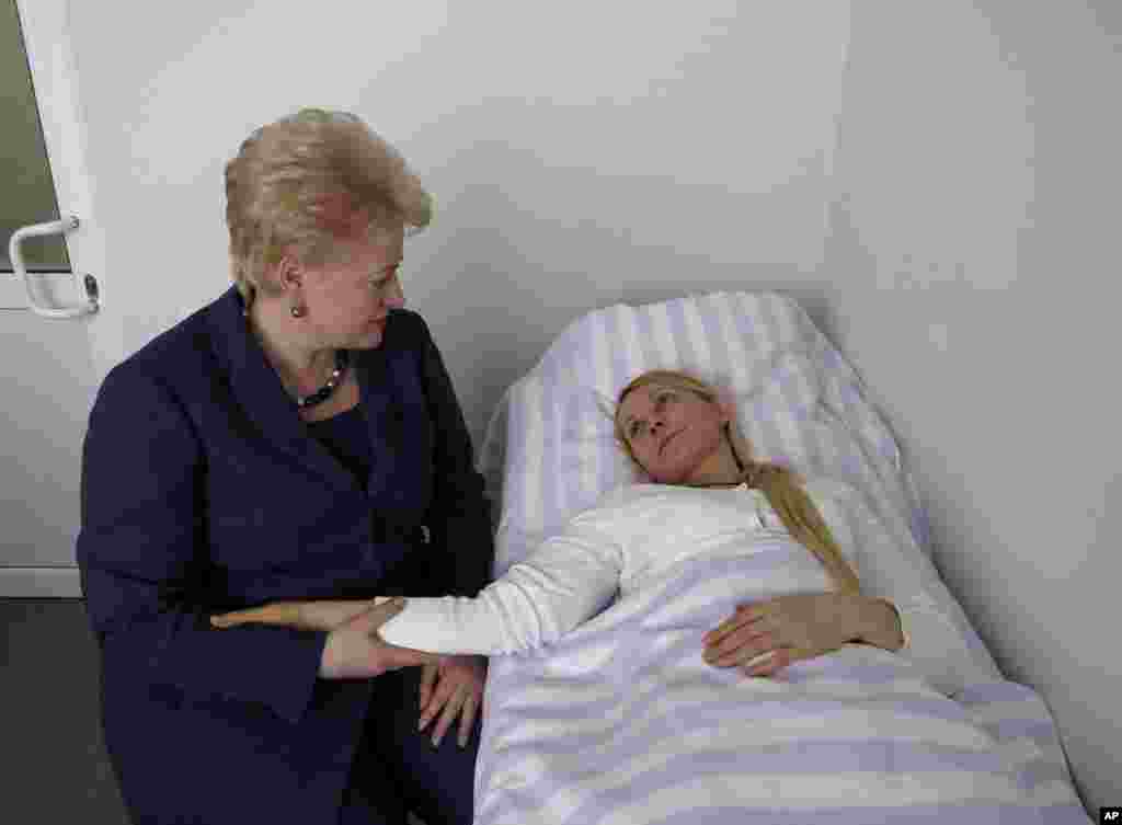 Lithuania's President Dalia Grybauskaite visits imprisoned former Ukrainian Prime Minister Yulia Tymoshenko in a hospital in the eastern Ukrainian city of Kharkiv, May 11, 2012.