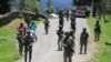 Pasukan keamanan berpatroli di Ilaga, Kabupaten Puncak di Papua, 30 September 2019. (Foto: Sevianto Pakiding/Antara Foto via Reuters)