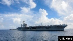 美国尼米兹号航母2020年6月24日停靠关岛（美国海军照片）