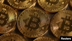 FILE PHOTO: Illustration shows representations of cryptocurrency Bitcoin