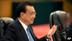 Chinese Premier Li Keqiang speaks during a meeting with Bangladesh's Prime Minister Sheikh Hasina at the Great Hall of the People in Beijing, July 4, 2019. 
