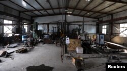 中國遼寧瀋陽一個工業園區裡的一家金屬熱處理工廠停工。（2021年9月30日）
