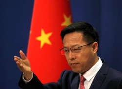 资料照片: 中国外交部发言人赵立坚在北京举行的记者会上回答问题。(2020年4月8日)