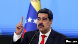 ARCHIVO - El presidente de Venezuela, Nicolás Maduro, habla durante una conferencia de prensa en Caracas, el 8 de diciembre de 2020.