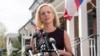 FILE - Then-Homeland Security Secretary Kirstjen Nielsen talks outside her home in Alexandria, Va., on April 8, 2019.