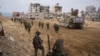 Foto yang dirilis militer Israel pada 2 Januari 2024 menunjukkan tentara Israel beroperasi di Jalur Gaza di tengah berlanjutnya pertempuran antara Israel dan kelompok militan Palestina Hamas.