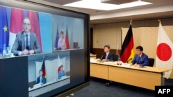 日本外务大臣茂木敏充和防卫大臣岸信夫与德国外长马斯举行视频会议。（2021年4月13日）