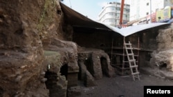 FILE PHOTO -- Ruins of a Roman archaeological site discovered during works to install a water drainage system, are seen in downtown Amman, Jordan, December 27, 2020. (REUTERS/Muhammad Hamed)