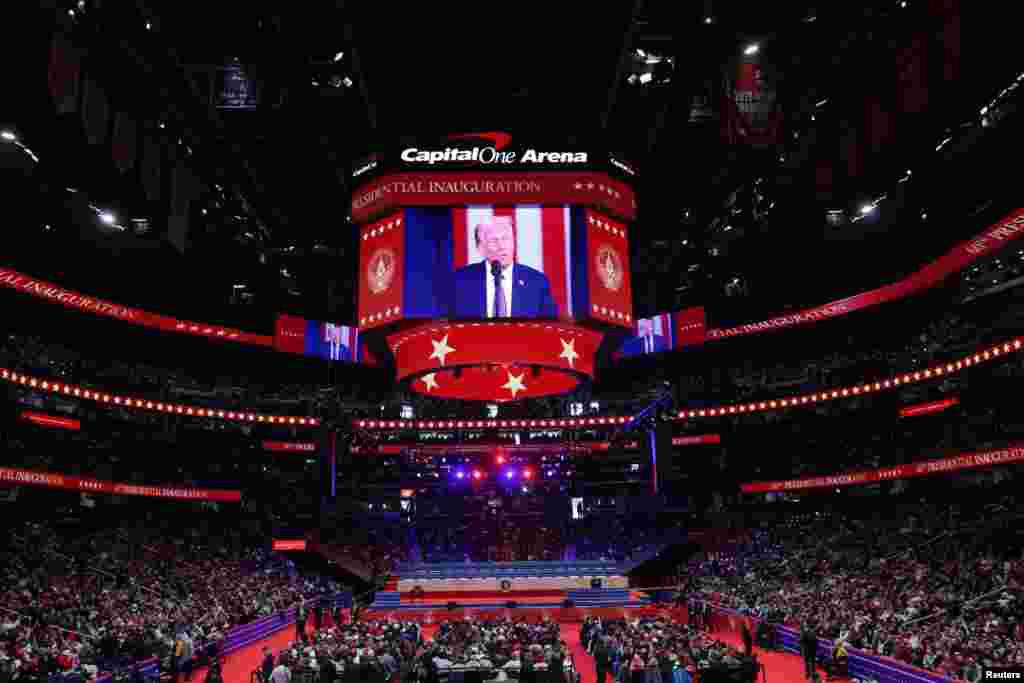 U.S President Donald Trump is shown on a screen on the inauguration day of his second Presidential term, inside Capital One, in Washington, Jan. 20, 2025.