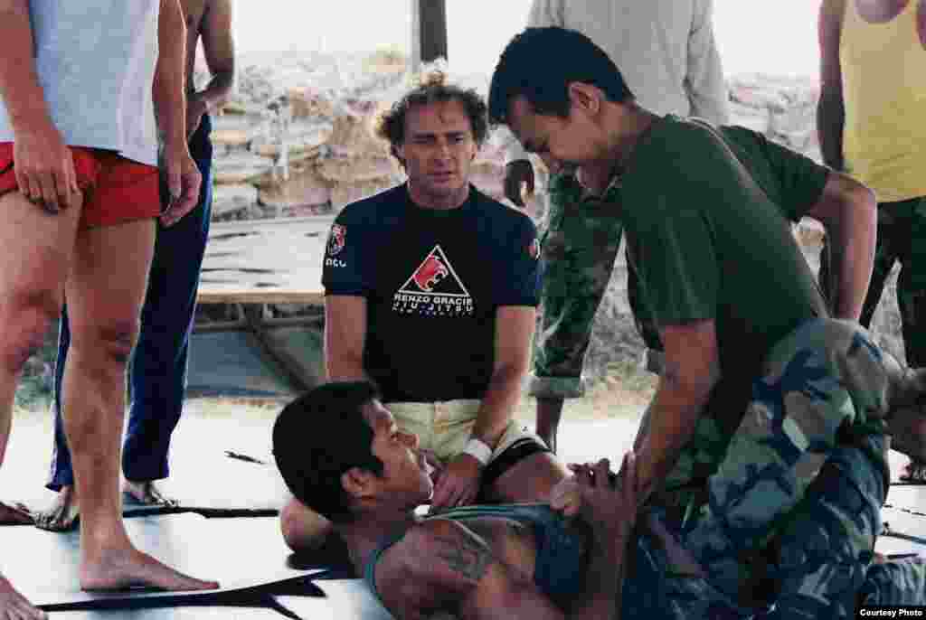 Peter Maguire, a former American journalist in Cambodia, observes Jiu Jitsu trainees in Cambodia in 1990s. (Courtesy photo/ Peter Maguire's archive)