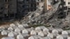A tent camp for displaced Palestinians is set up next to destroyed buildings following the Israeli air and ground offensive in Jabaliya, Gaza Strip, Feb. 6, 2025.