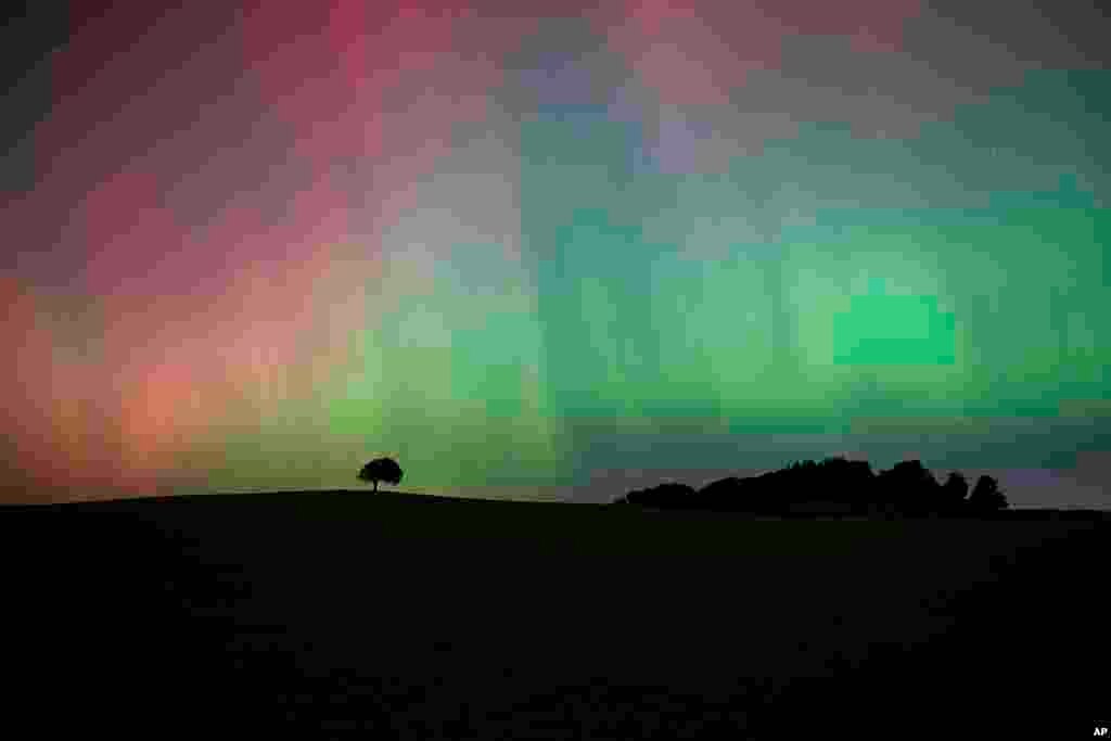 The Northern Lights, also known as the Aurora Borealis, are seen in the sky near Knaresborough, England.