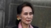 FILE - Myanmar's Aung San Suu Kyi leaves the International Criminal Court after the first of three days of hearings in The Hague, the Netherlands, Dec. 10, 2019. 