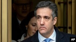 Michael Cohen, President Donald Trump's former lawyer, leaves federal court after his sentencing in New York, Dec. 12, 2018.