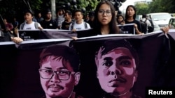 စက်တင်ဘာ ၁ ရက်နေ့က Reuters သတင်းထောက်နှစ်ဦး ပြန်လွှတ်ပေးရေး အတွက် ဆန္ဒပြစဉ်