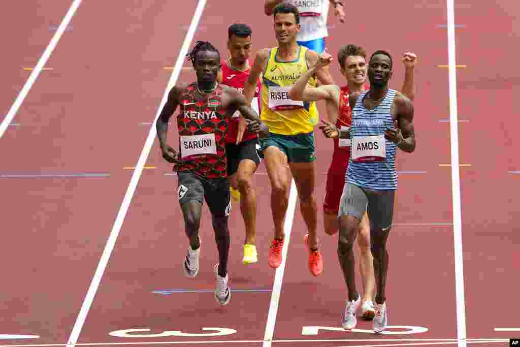 Nijel Amos, of Botswana, wins a heat in the men's 800-meter run at the 2020 Summer Olympics, Saturday, July 31, 2021, in Tokyo. (AP Photo/Charlie Riedel)