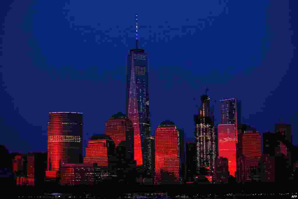 (FILE) This file photo shows the One World Trade Center tower in New York on July 3, 2016. - It is the skyscraper that replaced the Twin Towers in New York's skyline. Inaugurated in 2014, the One World Trade Center has become a symbol of resilience after the horror of 9/11.