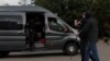 Law enforcement officers detain a journalist in central Minsk, Belarus, August 27, 2020.